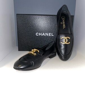 CHANEL Black Loafers with Gold Emblem